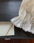 28a69 - RUFFLE HEM TOP