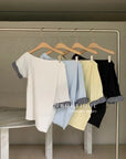 12a52 Asymmetrical gingham-sleeve set – pastel tones