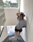 12a52 Asymmetrical gingham-sleeve set – pastel tones