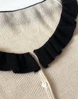 17a36 Off-shoulder knit top with ruffled neckline