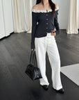 17a36 Off-shoulder knit top with ruffled neckline