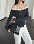17a36 Off-shoulder knit top with ruffled neckline