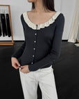17a36 Off-shoulder knit top with ruffled neckline