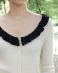 17a36 Off-shoulder knit top with ruffled neckline