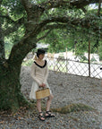 17a36 Off-shoulder knit top with ruffled neckline