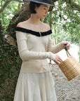 17a36 Off-shoulder knit top with ruffled neckline