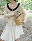 17a36 Off-shoulder knit top with ruffled neckline