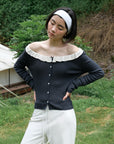 17a36 Off-shoulder knit top with ruffled neckline