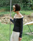 17a36 Off-shoulder knit top with ruffled neckline