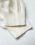 17A28 Off-shoulder Mongtoghi cashmere top with button detail
