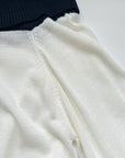 17A28 Off-shoulder Mongtoghi cashmere top with button detail