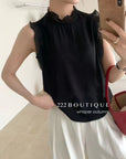16a23 Sleeveless cotton top with lace trim