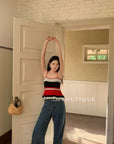 14a20 Spaghetti strap top with ruffled hem