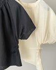 14a7 Round-neck blouse with side-gathered waist