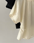 14a7 Round-neck blouse with side-gathered waist