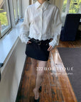 16a74 Cropped floral-hem cotton shirt