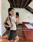 16a71 Mongtoghi sleeveless top with tie-neck