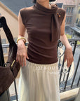 16a71 Mongtoghi sleeveless top with tie-neck