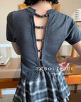 16A73 Back cut-out Mongtoghi tee with pearl buttons