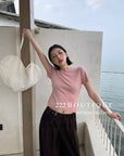 16A73 Back cut-out Mongtoghi tee with pearl buttons