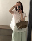 14a5 Basic round-neck shirt with cross-front detail