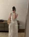 14a3 Sleeveless lace top with ruffled neckline and bodice