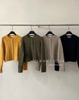 18a45 Beige cable-knit cashmere cardigan