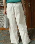 13q25 Long wide-leg pants with front overlay