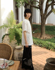 13a66 Graphic tee with ruffled hem