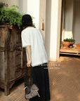 13a66 Graphic tee with ruffled hem