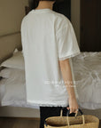 13a66 Graphic tee with ruffled hem