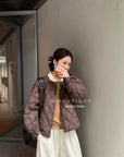 19a93 Fur-quilted puffer jacket