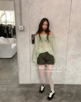 12a9 Sheer ruffle blouse – sage green or white