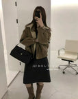 19a89 Reversible suede–fur coat