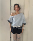 12a52 Asymmetrical gingham-sleeve set – pastel tones