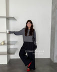 17q16 Straight-leg trousers with ruffled elastic hem