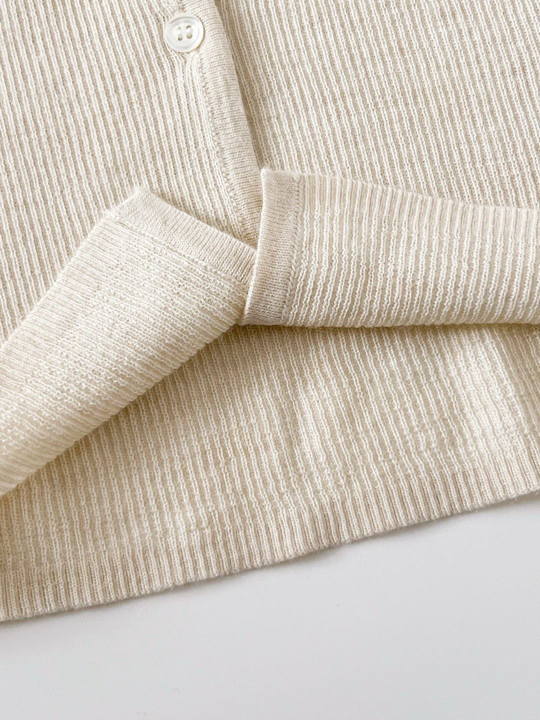 17a36 Off-shoulder knit top with ruffled neckline