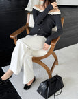 17a36 Off-shoulder knit top with ruffled neckline