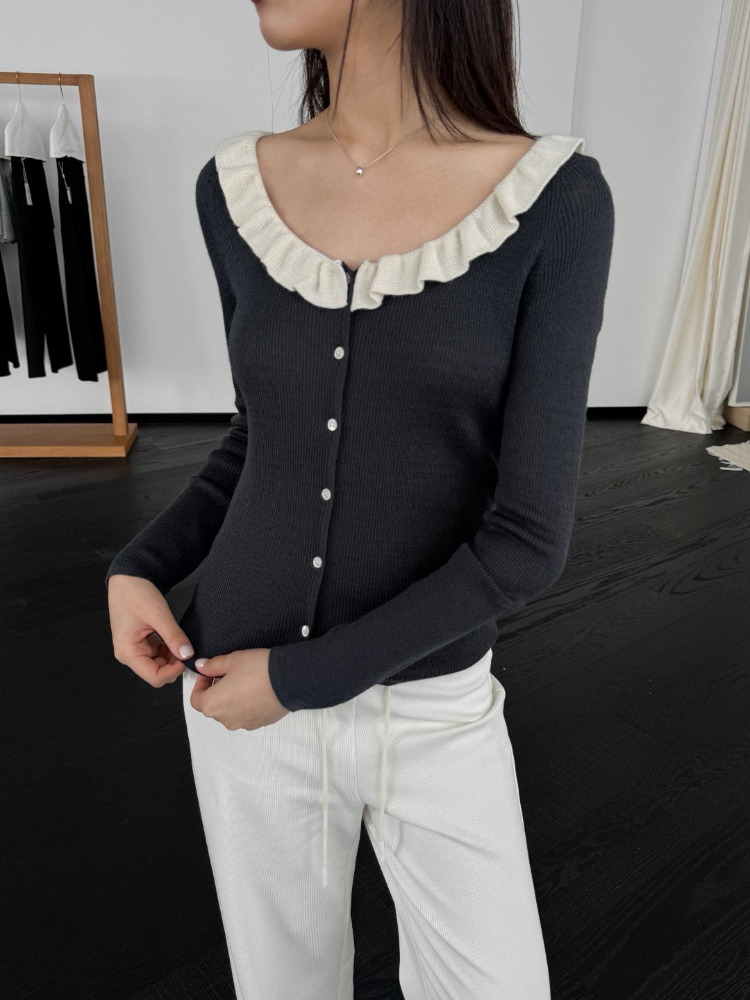 17a36 Off-shoulder knit top with ruffled neckline