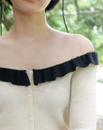 17a36 Off-shoulder knit top with ruffled neckline