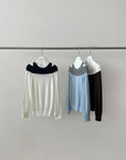 17A28 Off-shoulder Mongtoghi cashmere top with button detail