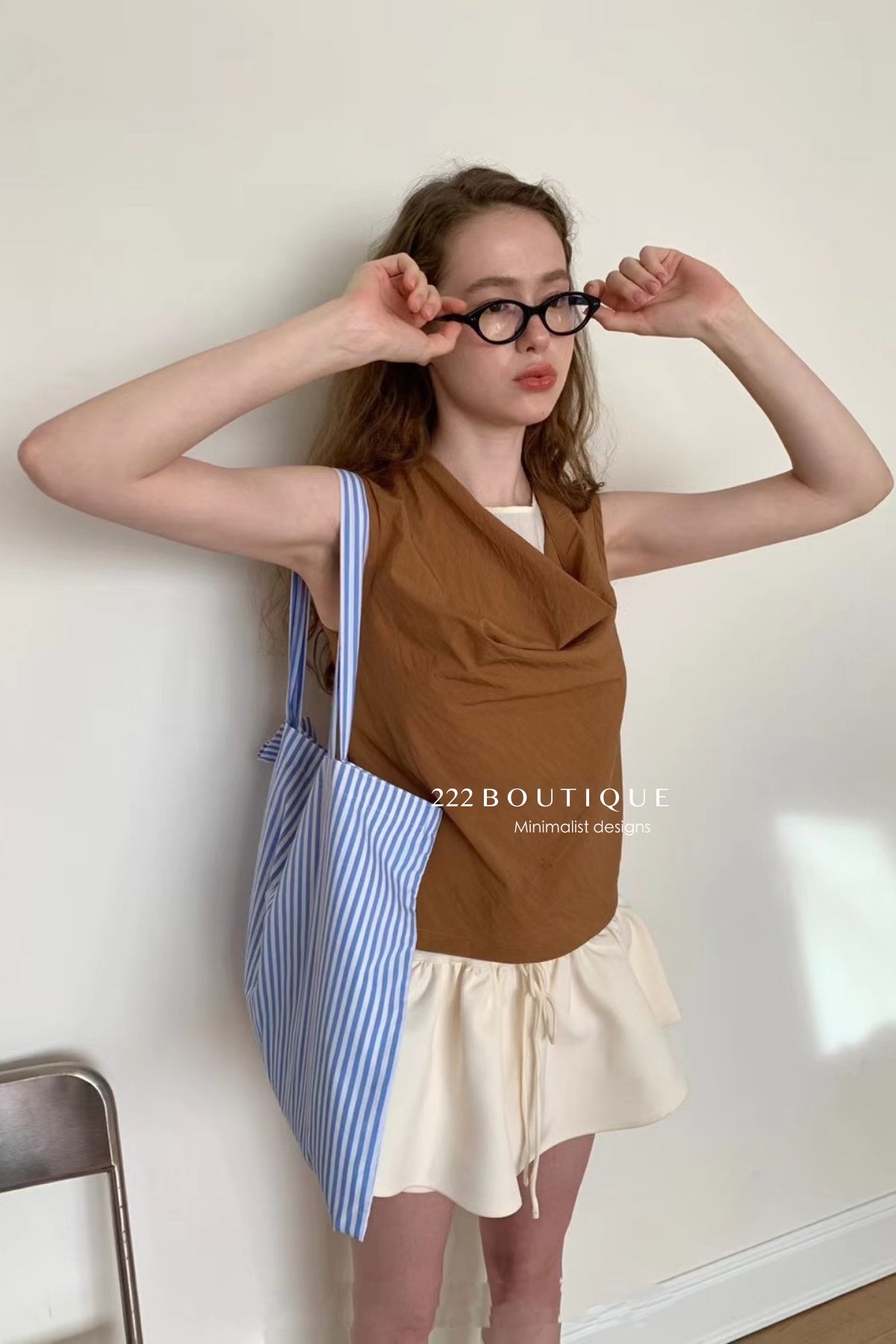 15a71 Draped-neck sleeveless top – soft texture, clean drape