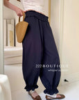16q9 Pleated hem trousers