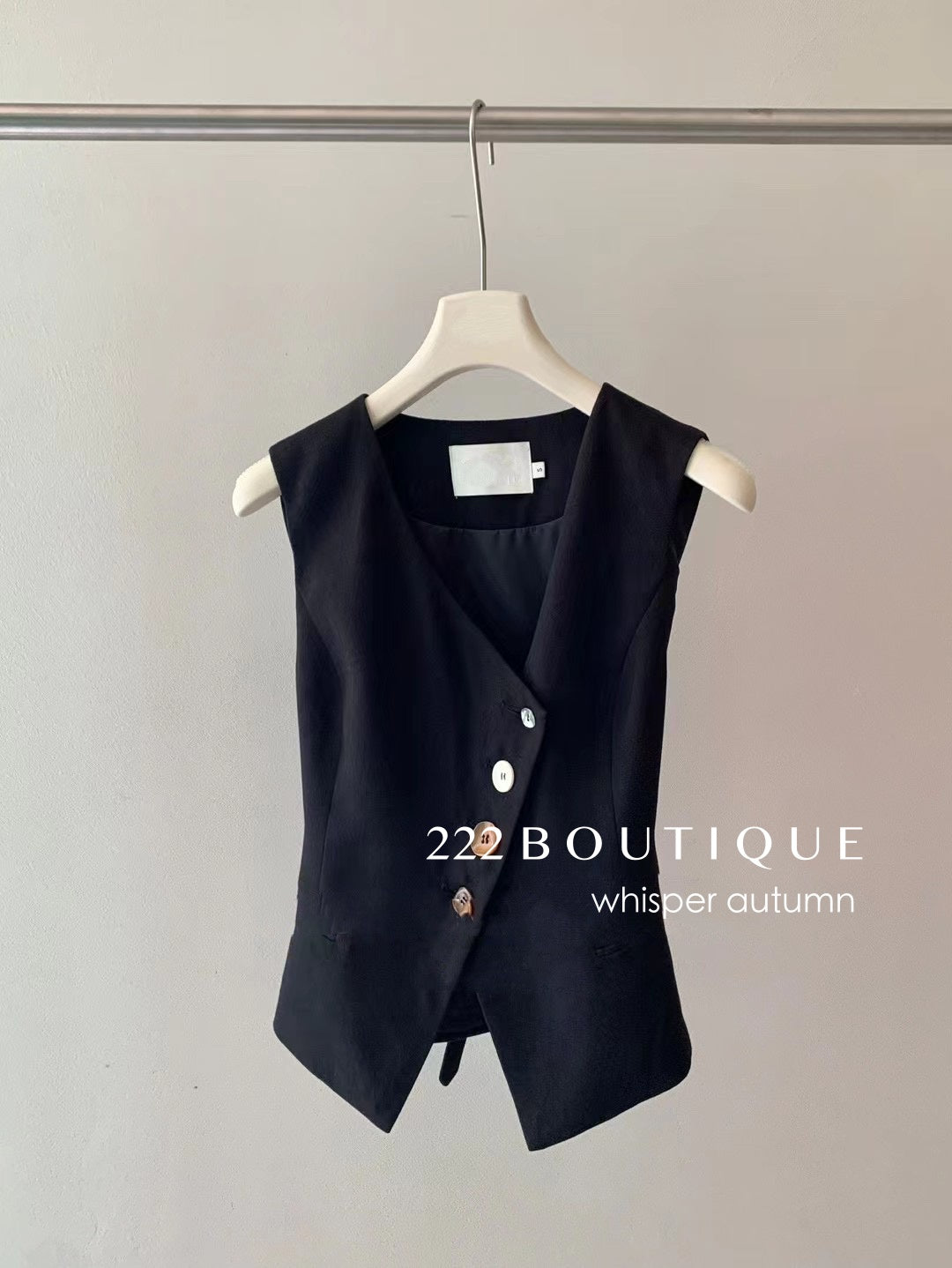 16a75 Asymmetrical-button gilet top