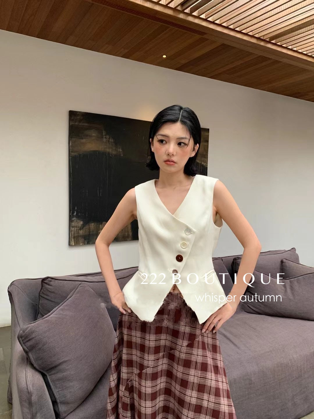 16a75 Asymmetrical-button gilet top