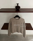 18a45 Beige cable-knit cashmere cardigan