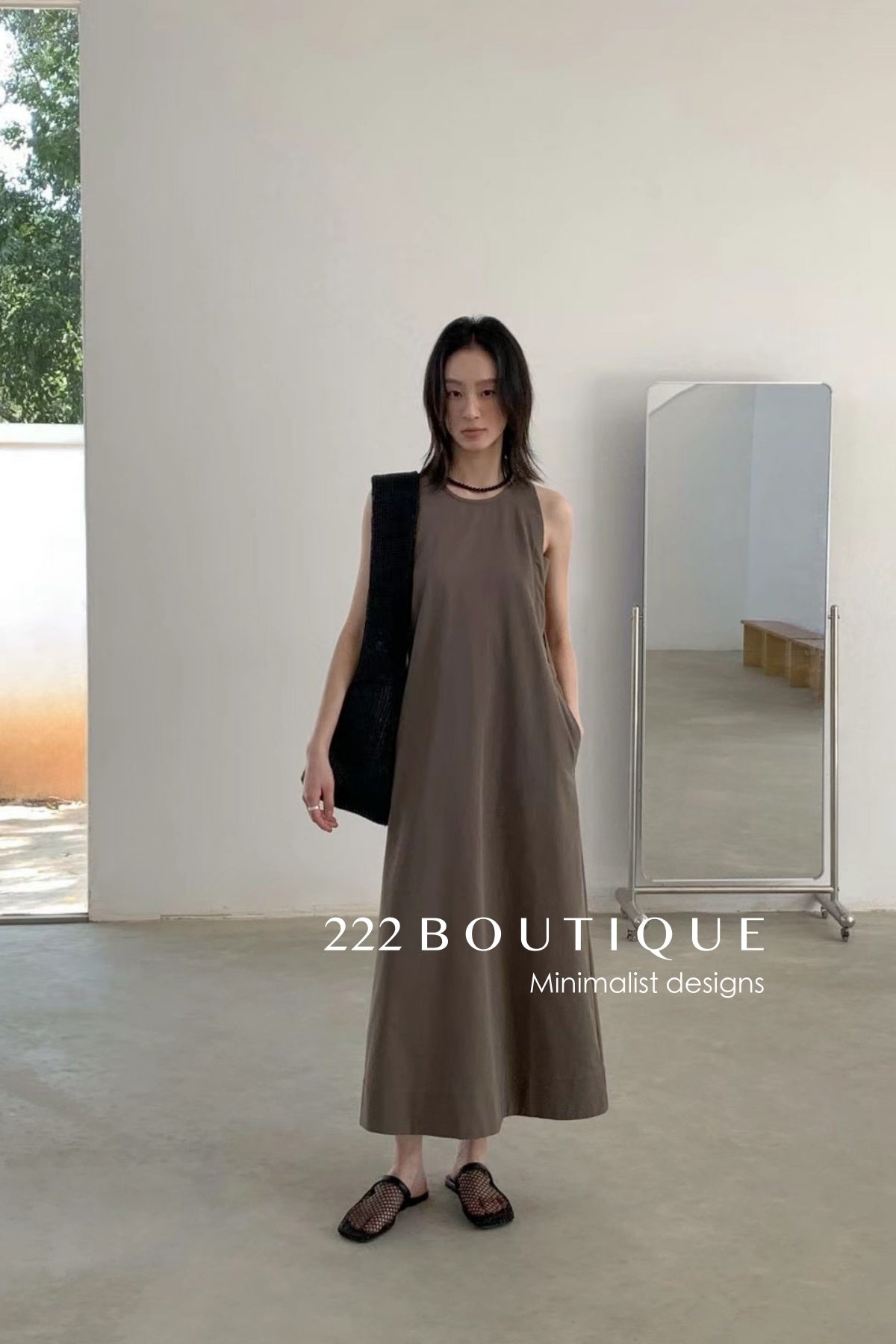 12v149 Sleeveless Flowy Dress – Refined Simplicity