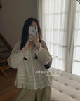 17a3 Long blouse with ruffled details