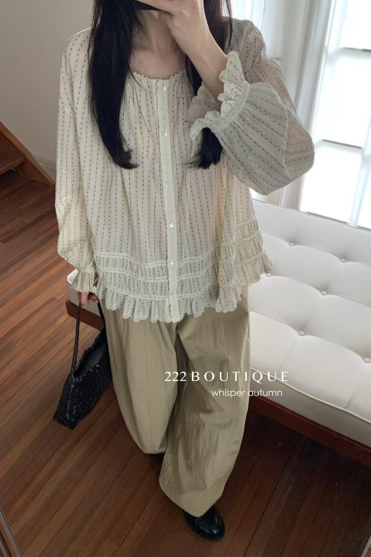 17a3 Long blouse with ruffled details
