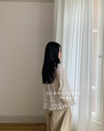 17a3 Long blouse with ruffled details